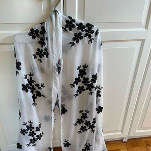 Very soft sheer large white scarf with embroidered black flowers.